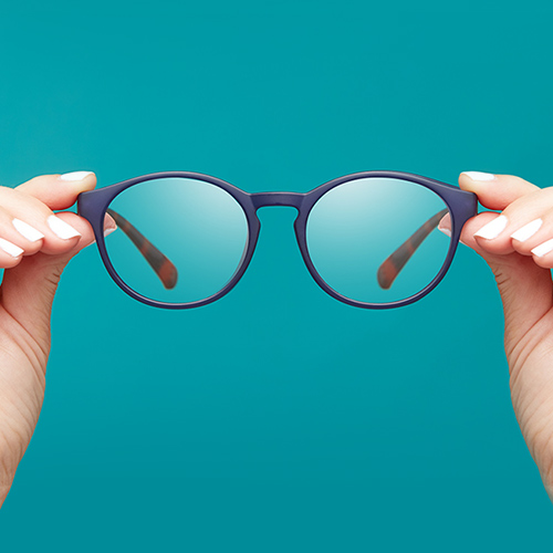 glasses with teal background