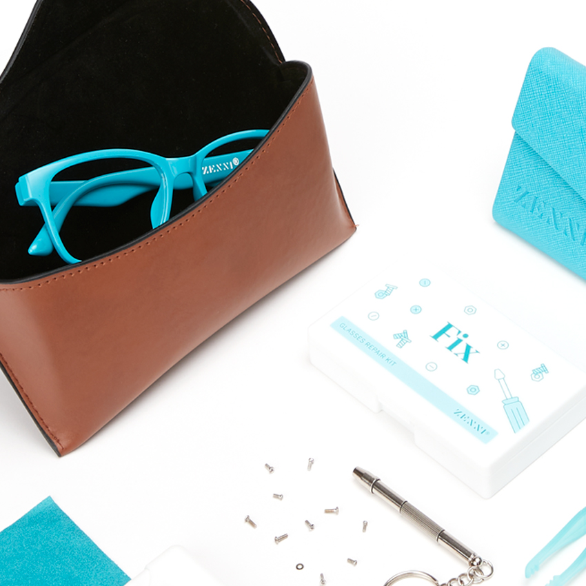 Turquoise eyeglasses in brown case, Fix glasses repair kit and screws, Zennie text on blue case.