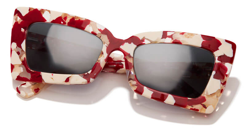 Square sunglasses with a red, pink, and cream floral frame and dark lenses.