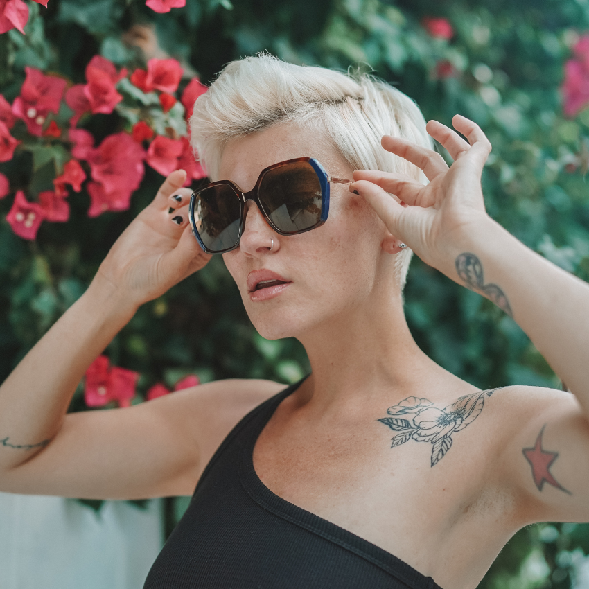 Free Photos - A Woman With Short Hair And A Punk Rock Look Wearing Vivid  Red Sunglasses, Making Her Stand Out. The Sunglasses Are Placed Atop Her  Head, Drawing Attention To Her