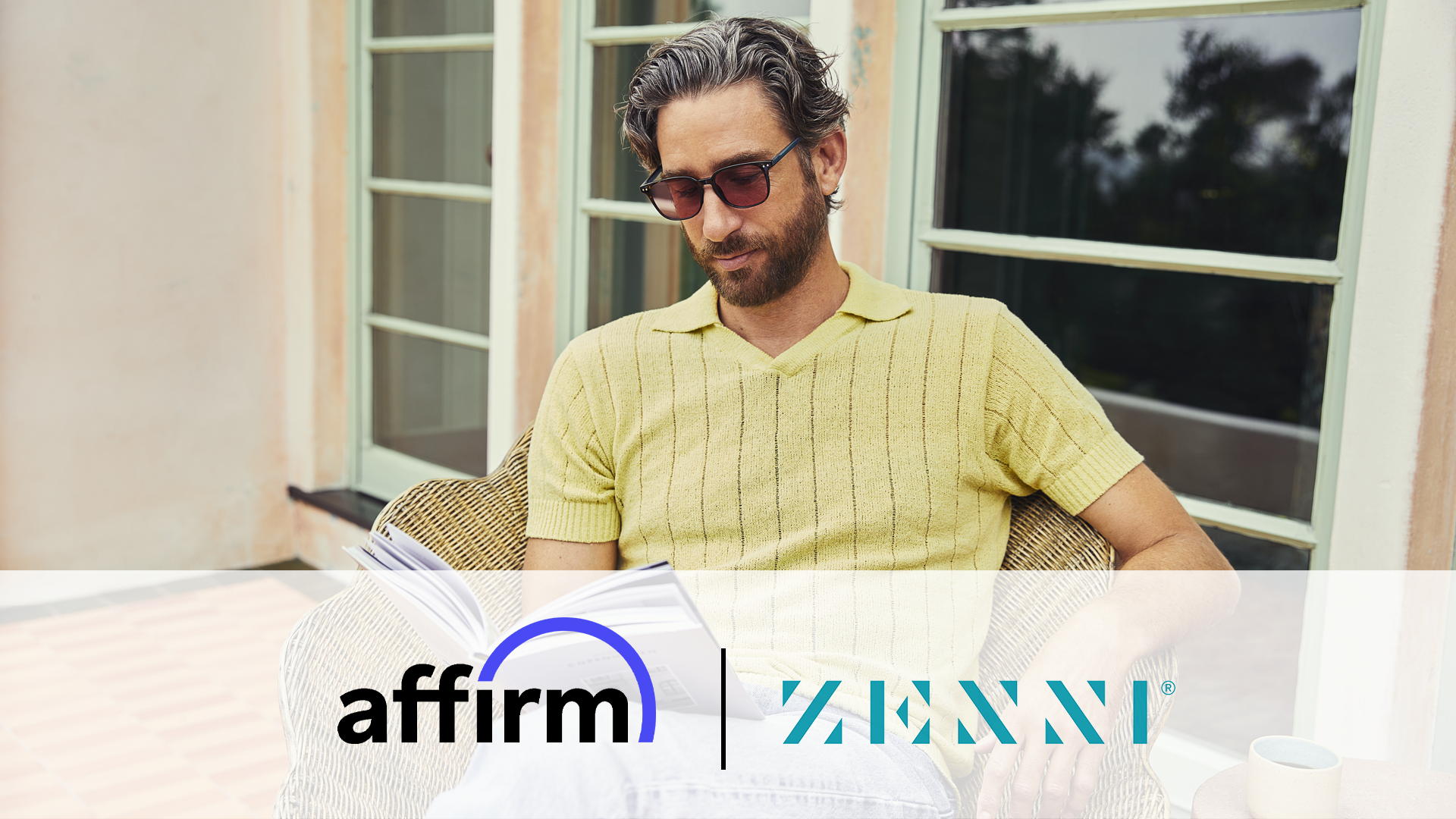 Affirm and Zenni logo, man wearing glasses and reading a book.