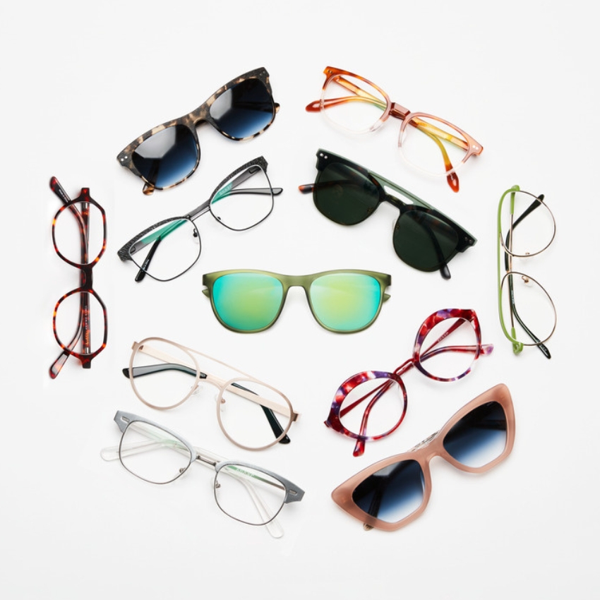 Various styles of eyeglasses and sunglasses arranged in a circle on a white background.