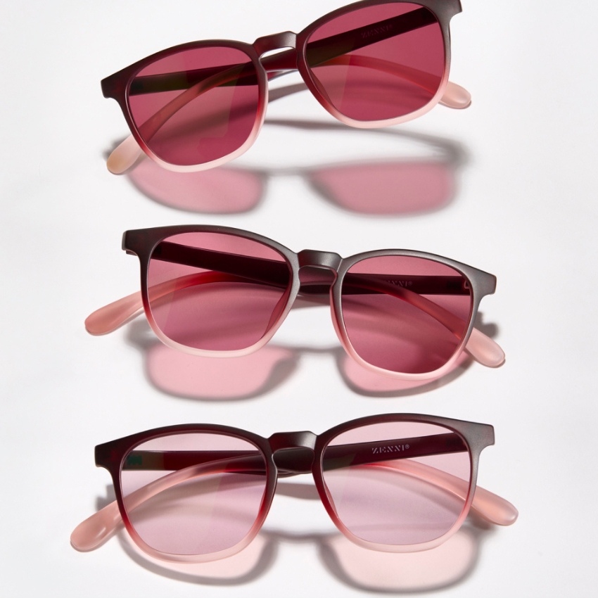 Three pairs of red and pink gradient sunglasses with "ZENNI" on the lenses.