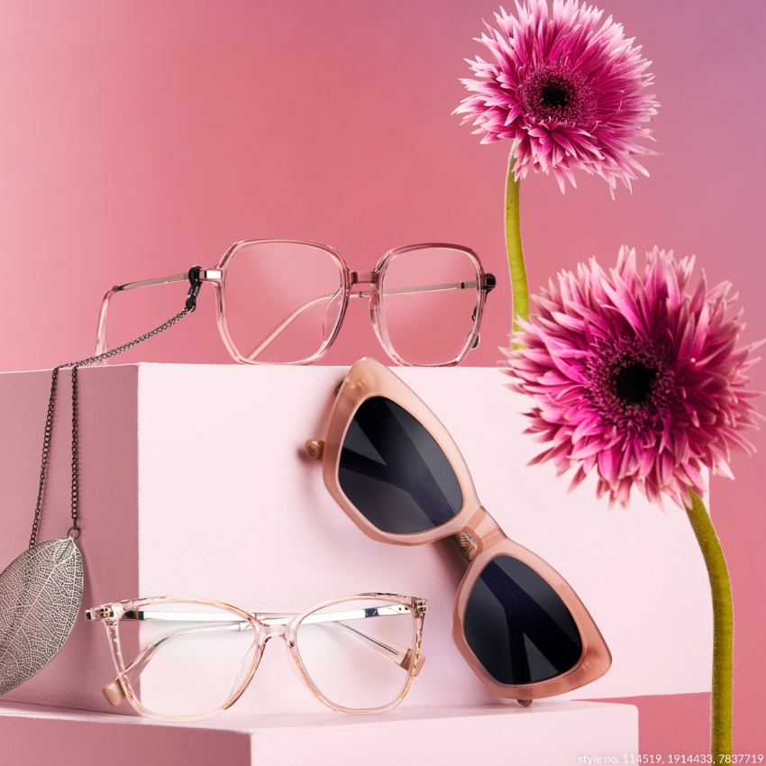 Three pairs of eyeglasses and sunglasses displayed on pink pedestals. Text on the bottom right: "style no. 114519, 1914433, 7837719".