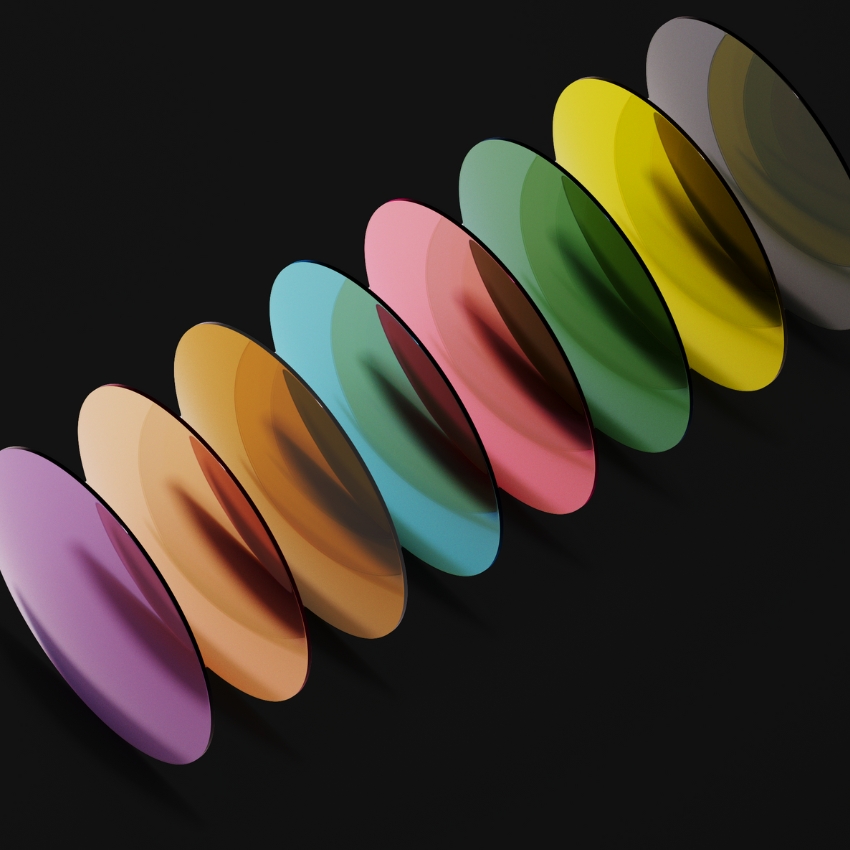 Gradient-colored round plates arranged in a row, each plate displaying a different color.