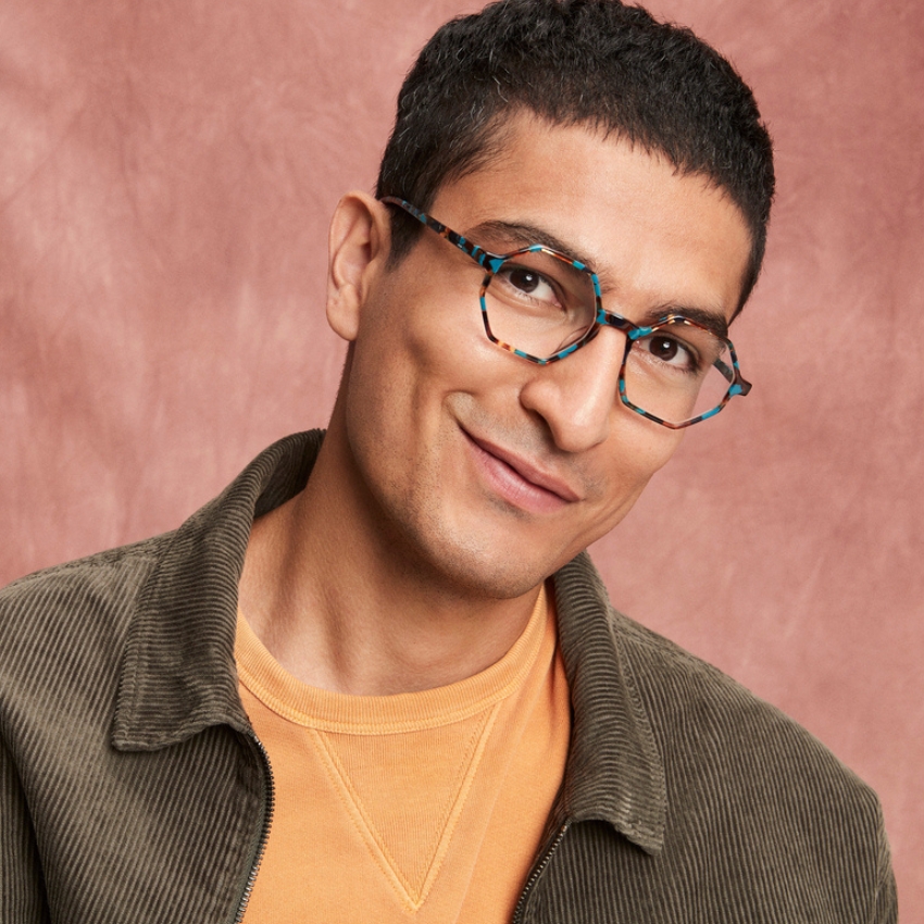 Man wearing tortoiseshell octagonal glasses.