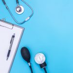 vecteezy_stethoscope-and-clipboard-isolated-on-blue-background_20101187Featured Image