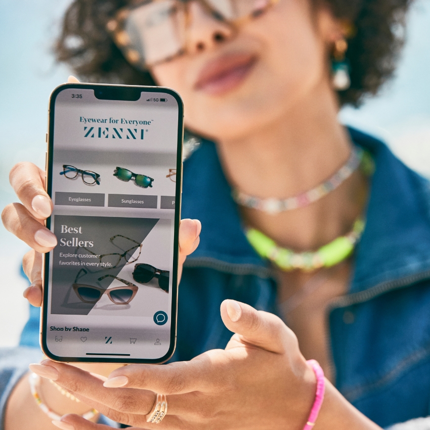 Smartphone screen displaying ZENNI website with "Eyewear for Everyone" and "Best Sellers" sections.
