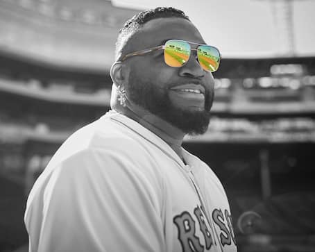 Image of David Ortiz wearing Zenni sunglasses in black and white, with color in the 
mirror lenses.