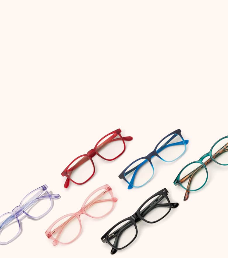 Flat-lay of red, blue ombre, green, pastel purple transparent, pink transparent, and black glasses.
