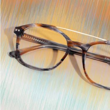 Square frames with stripes in different tones of brown and grey.